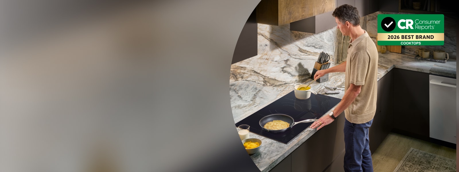 Person cooking on an LG cooktop in a kitchen, with Consumer Reports 2026 Best Brand Cooktops badge.