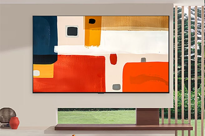 LG OLED evo AI G6 showcases a large, vibrant abstract painting centered on a white wall and elevating the modern interior into a curated gallery-like atmosphere.