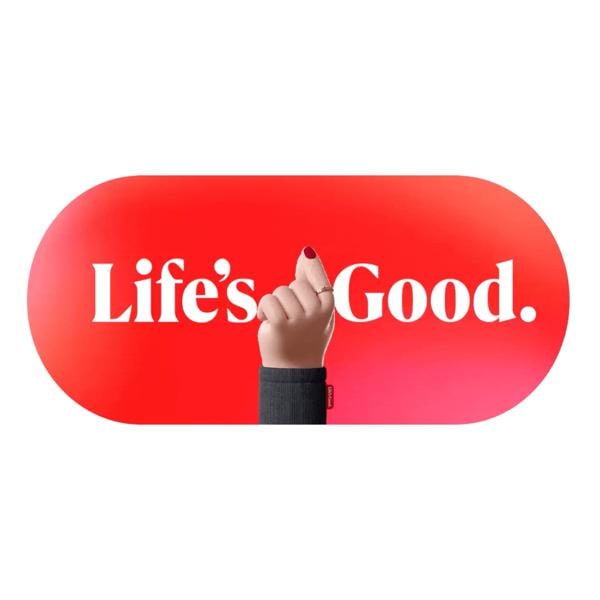 “Life’s Good.” logo and text appear on a white background as a 3D hand displays the “heart” sign in the center.