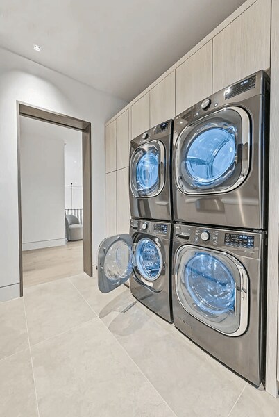 Laundry room showcasing LG Washres and dryers
