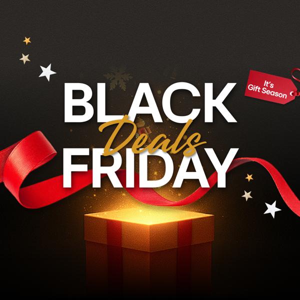 Black Friday promotional graphic with bold white and gold text reading 'Black Friday Deals' above a glowing gift box wrapped in red ribbon. Stars and a red tag reading 'It’s Gift Season' decorate the background.