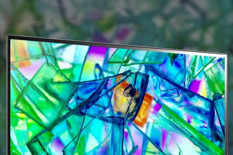 Close-up of a vibrant abstract design on a Computer screen  with colorful glass-like shapes.