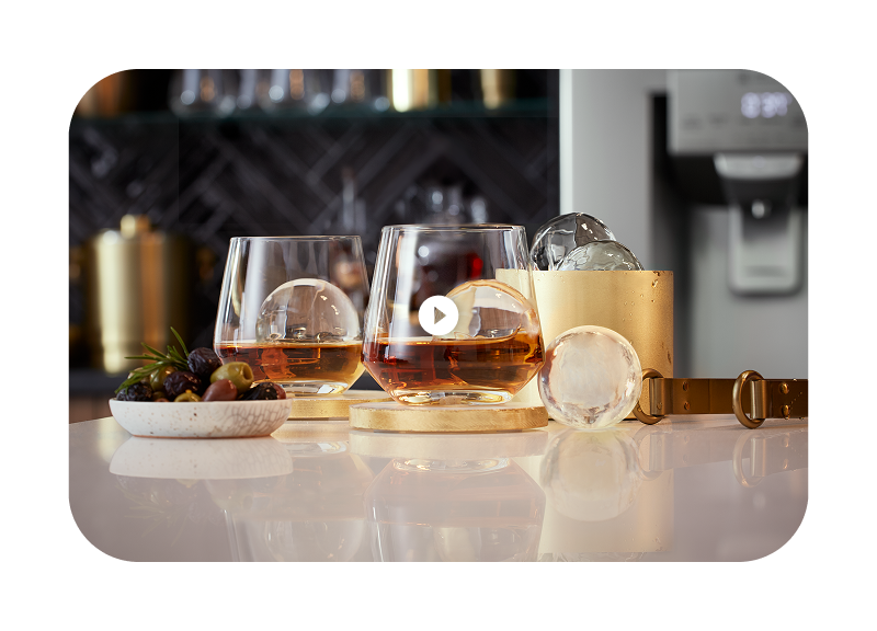 closeup of wine glasses and appetizers on a table