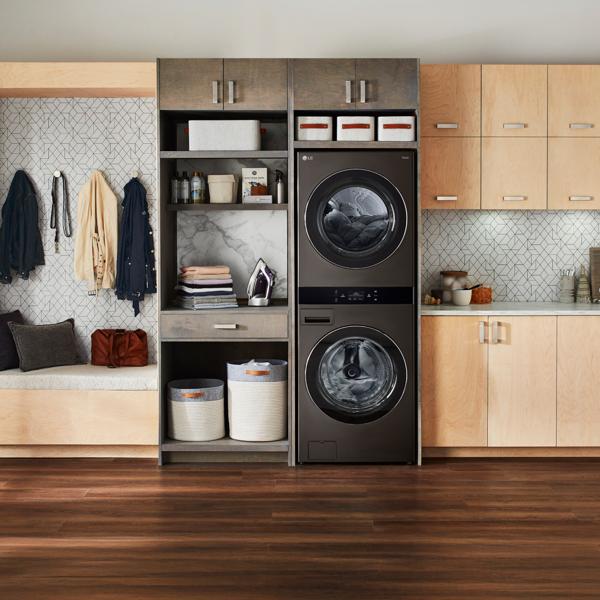 An LG WashTower appears in a stylish laundry room setting.