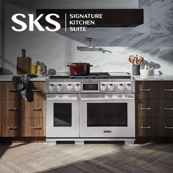 SKS Signature Kitchen Suite - front view of a LG Dual Fuel Range in a kitchen surrounded by cabinetry. 