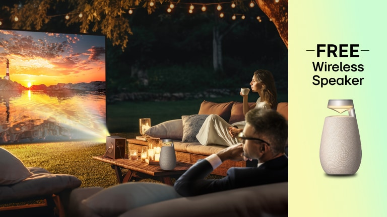 A CineBeam Q projects onto an outdoor screen as a man and woman look on. Pop-out image of a portable speaker with text “FREE Speaker”.