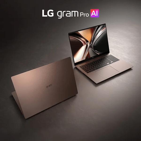 LG gram Pro AI laptop shown in bronze with one device closed and another open displaying an abstract swirl graphic.