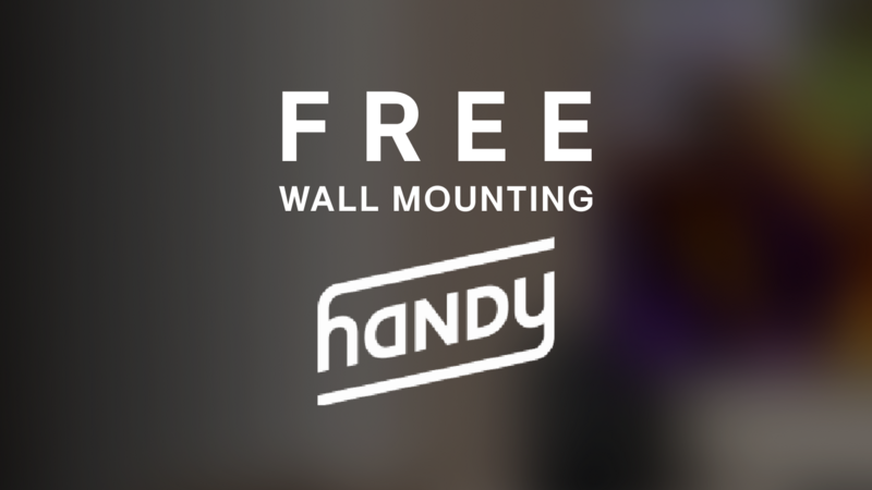 A promotional sign stating "Free Wall Mounting" highlighting the service offered.