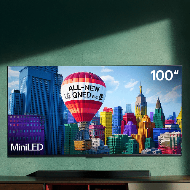 TV displays hot air balloon that reads “ALL-NEW LG QNED evo AI.” “100”” and “MiniLED” appear in corners of the TV.