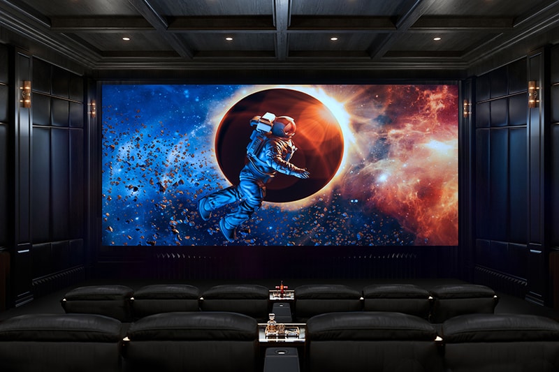 Home theater with an astronaut floating in space on a large screen.