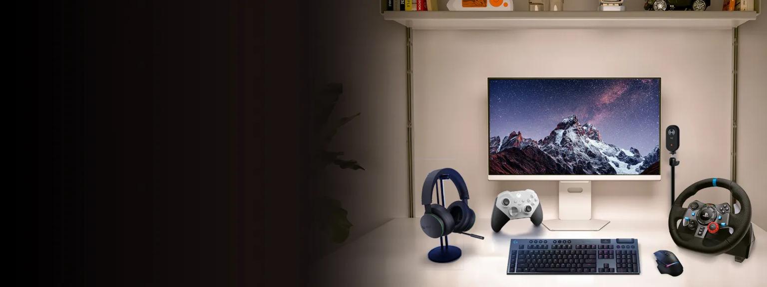 An LG Monitor appears on a pristine desktop along with an Xbox wireless controller and Headset and a Logitech Mouse and Keyboard. 