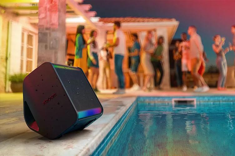 xboom Stage 301 sitting poolside at a party