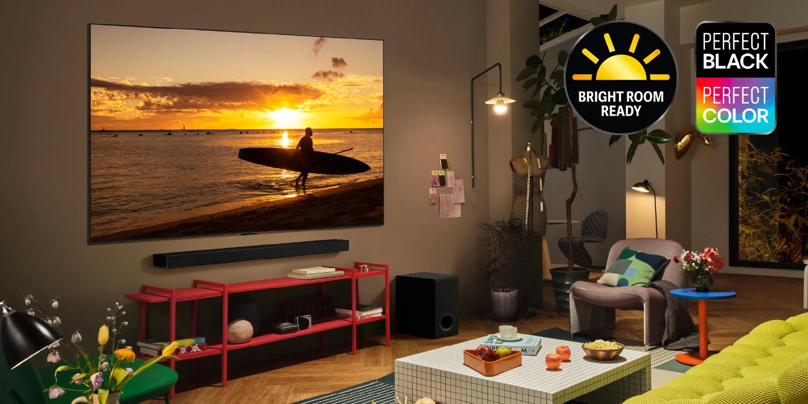 A wall-mounted TV in a living room. Bright Room Ready Badge. Perfect Black Perfect Color Badge.