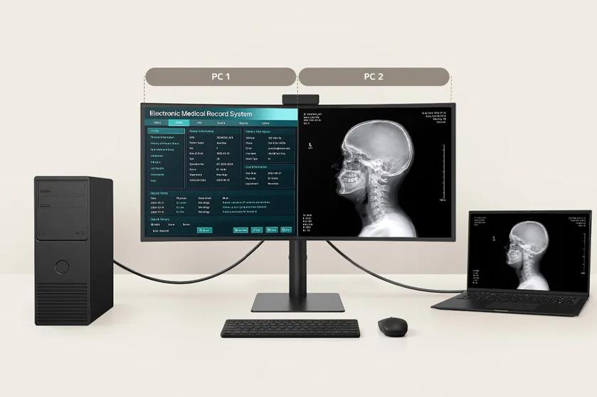 LG 40HT513D displaying content from two PCs with 3PBP and built-in KVM using a single keyboard and mouse.	
