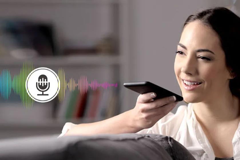 A hotel guest controls the LG Hospitality TV through voice control.