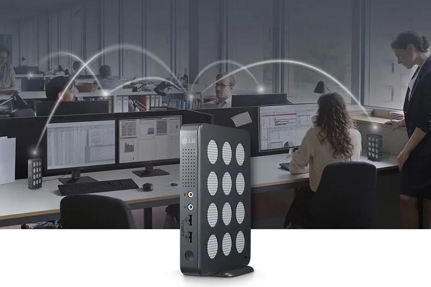 A busy office in the background, with an LG box type cloud client in the foreground.