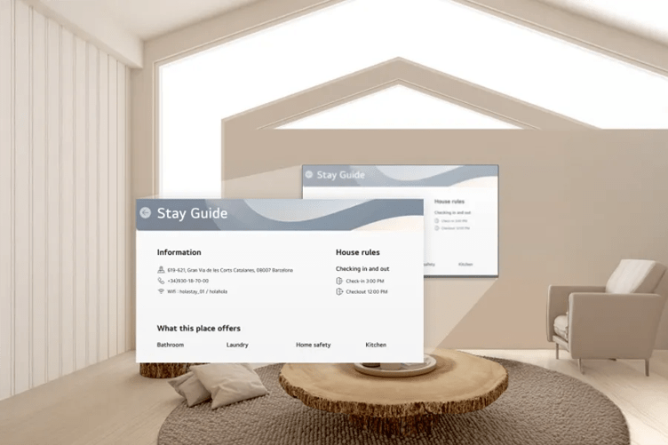 A modern living room with a large window, armchair, round wooden coffee table, and a monitor displaying a "Stay Guide."

Transcribed Text:

Stay Guide

Information 619-621, Gran Via de les Corts Catalanes, 08007 Barcelona +34(0)30-10-00 WiFi: holastay_01 / holahola

House rules Checking in and out Check-in 3:00 PM Checkout 12:00 PM

What this place offers Bathroom Laundry Home safety Kitchen