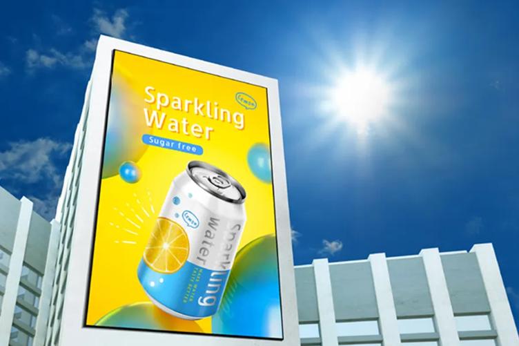 Billboard advertisement for sparkling water against a sunny blue sky, featuring a yellow background and an illustrated can with citrus graphics.