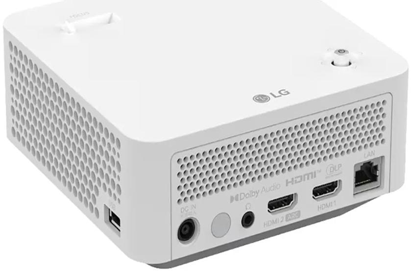 A white LG projector with ventilation holes and multiple ports including USB, HDMI, and LAN.