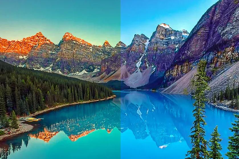 A landscape split into warm sunset colors on the left and cool blue tones on the right.