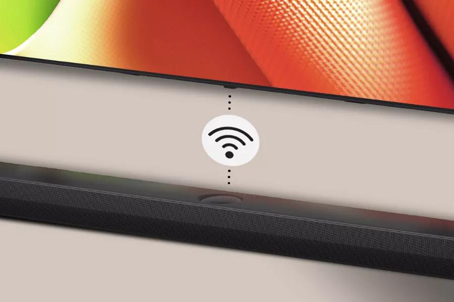 The LG UT7570 connects wirelessly to a speaker below it.