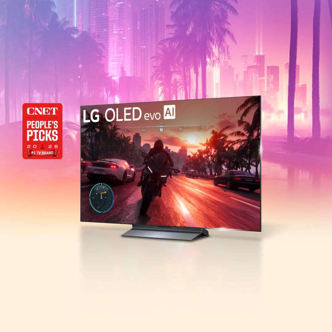 LG OLED evo AI TV showing a racing video game with a motorcycle on a sunset city highway, CNET People’s Picks 2026 #1 TV Brand badge.