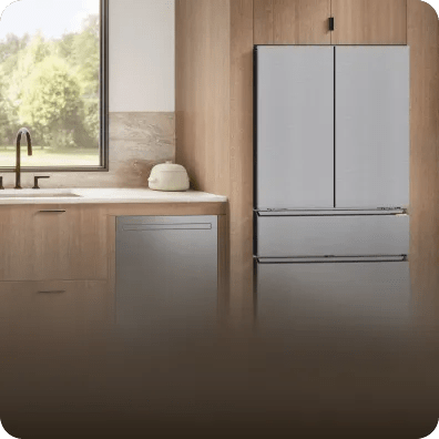 LG SIGNATURE Seamless Collection in a kitchen with integrated stainless appliances, flush cabinetry, and warm wood finishes emphasizing seamless design and precision.