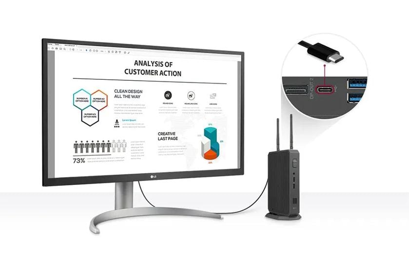 An LG box type thin client connected to a monitor.