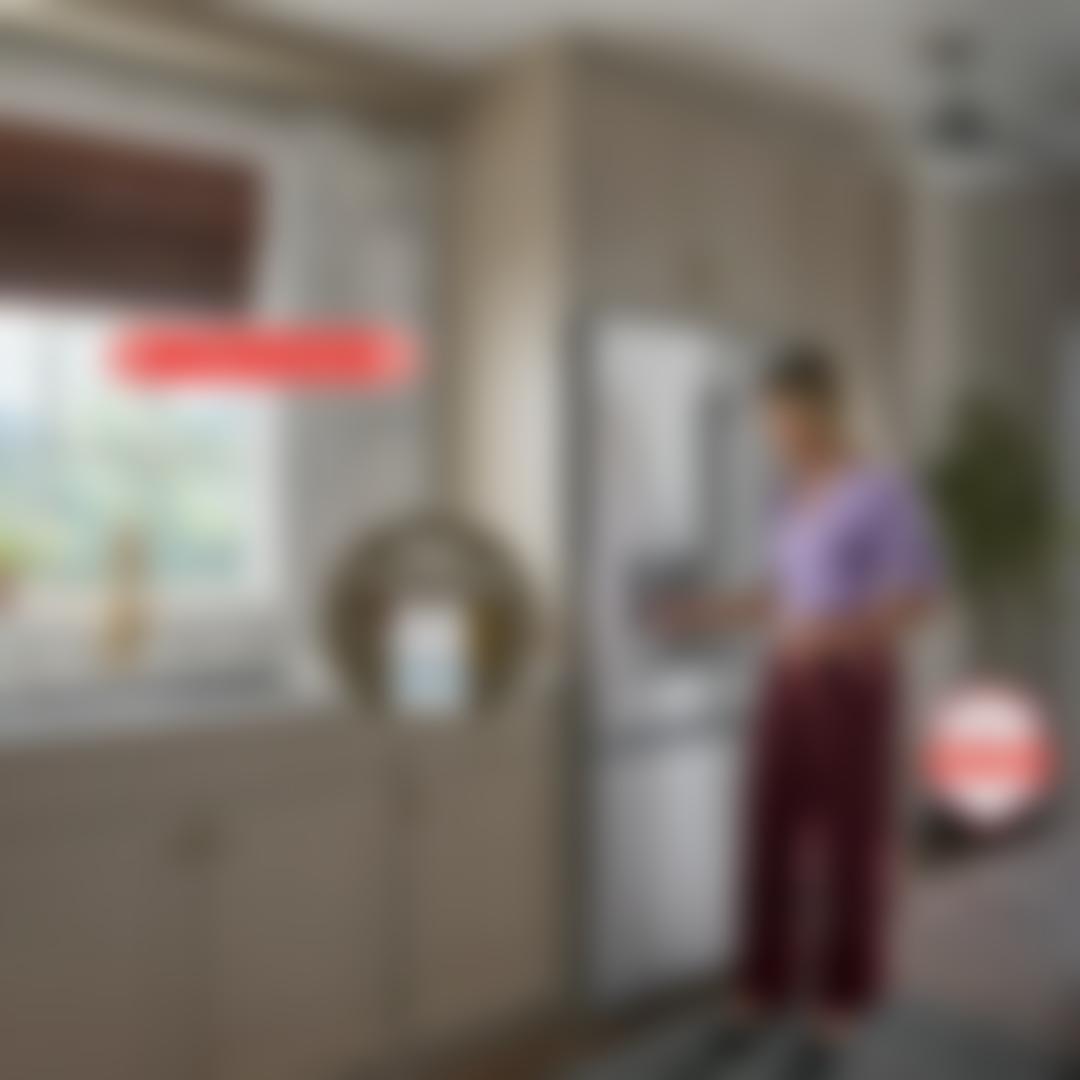 A woman in a lavender top fills a glass at the water dispenser of an LG stainless steel French door refrigerator in a kitchen, with badges for 'LG Online Exclusive,' 'Free 2-pack water filters,' and 'America's Most Reliable Line of Appliances.'