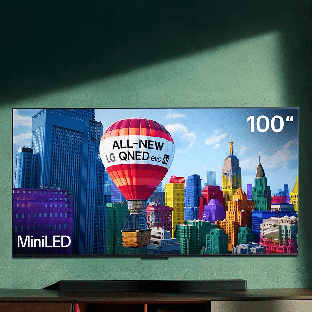 TV displays hot air balloon that reads “ALL-NEW LG QNED evo AI.” “100”” and “MiniLED” appear in corners of the TV.