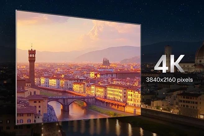 LG TV with 4K resolution displays a brightly lit sunset cityscape with 3840x2160 pixels, emphasizing sharp image clarity, vivid color expression, and an immersive everyday viewing experience.