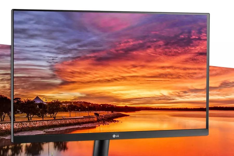 Image of a 24ML600 B monitor on a background of a sunset and a river
