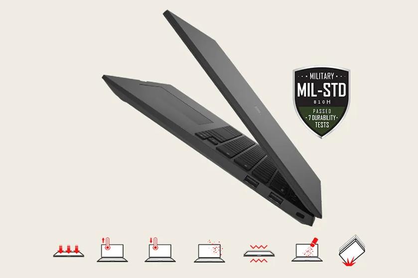The image shows a partially open black laptop viewed from the side, against a light beige background. The laptop's keyboard and screen are visible, with the screen angled slightly toward the keyboard. Near the top right of the image, there is a badge resembling a shield that states the laptop has passed military-grade durability tests. Below the laptop, there are five simple icons depicting various types of stress or durability tests, each featuring a stylized laptop and red symbols representing pressure, heat, impact, dust, and vibration.