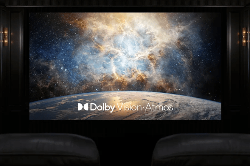 Home theater room with a large screen showing a bright nebula and planet.

Transcribed Text:

Dolby Vision Atmos.