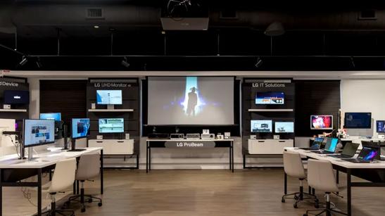 IT projector, computer monitors, and gram laptops on display at the LG Chicago Business Innovation Center