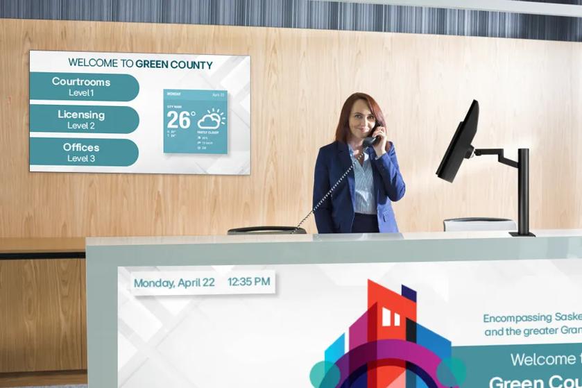 City hall receptionist uses LG monitor and signage