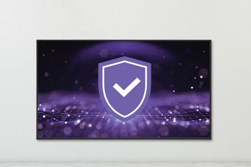 Purple shield with a white checkmark on a futuristic digital background.