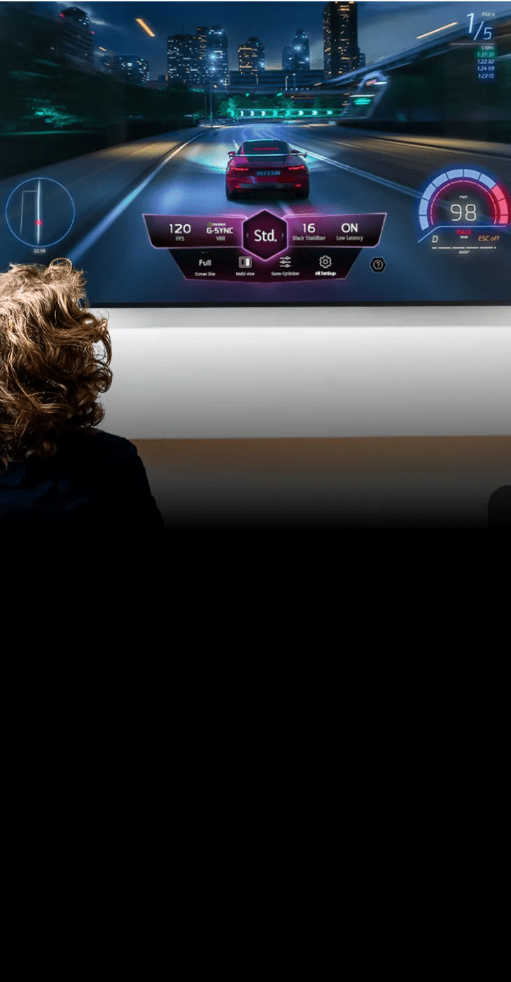 A person playing racing game on OLED TV.