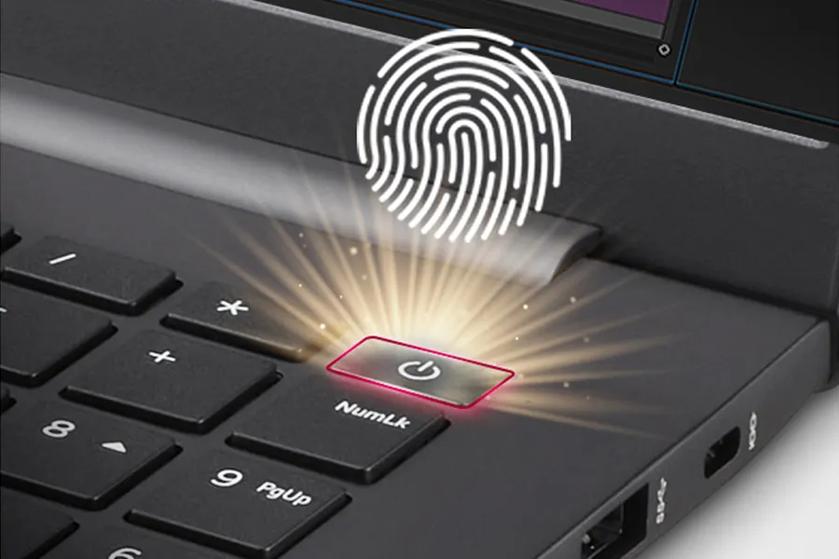 The viewer is up close to a black, LG UltraPC keyboard. The power button is lit up in gold, highlighting a fingerprint-styled circle.