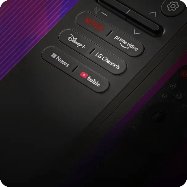 Closeup of an LG Magic Remote with Netflix, Prime Video, Disney+, YouTube and LG Channels shortcut buttons on a dark background.