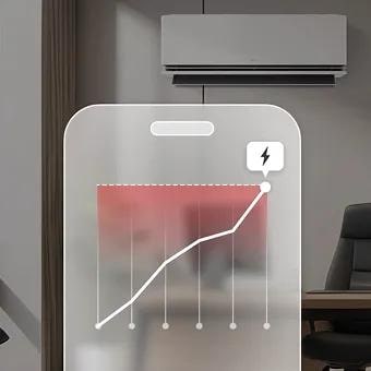 Smartphone interface showing energy consumption graph in front of LG air conditioner, highlighting AI kW Manager for efficient power monitoring.