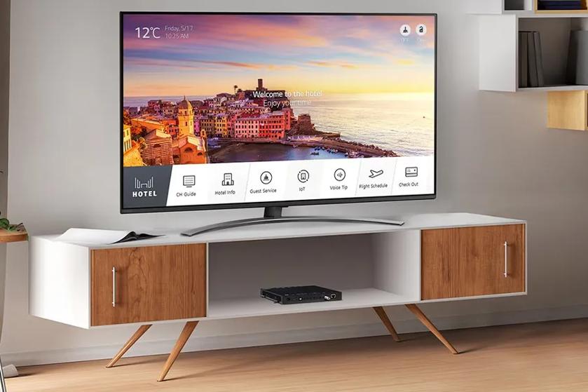 LG TV and ProCentric box in a hotel room displaying the ProCentric TV menu.