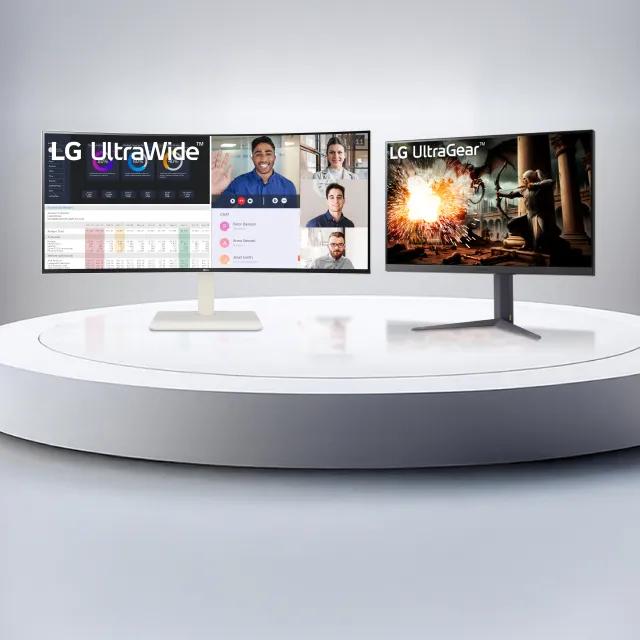 LG UltraWide and LG UltraGear monitors on a stand against a white background, showcasing a sleek and modern setup.