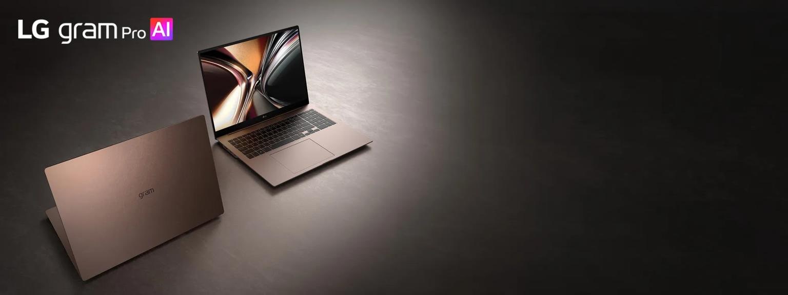 Two LG gram Pro AI laptops shown in bronze with one device closed and another open displaying an abstract swirl graphic.