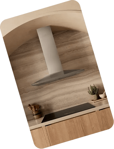 LG SIGNATURE range hood and induction cooktop installed in a kitchen with warm wood cabinetry
