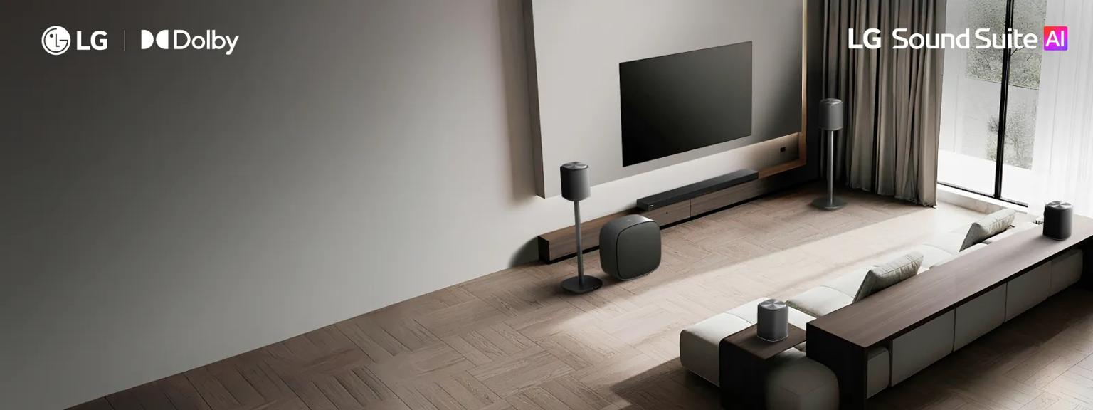 “LG Sound Suite AI” and “LG + Dolby” badges. A bright living room with an LG TV and soundbar setup.