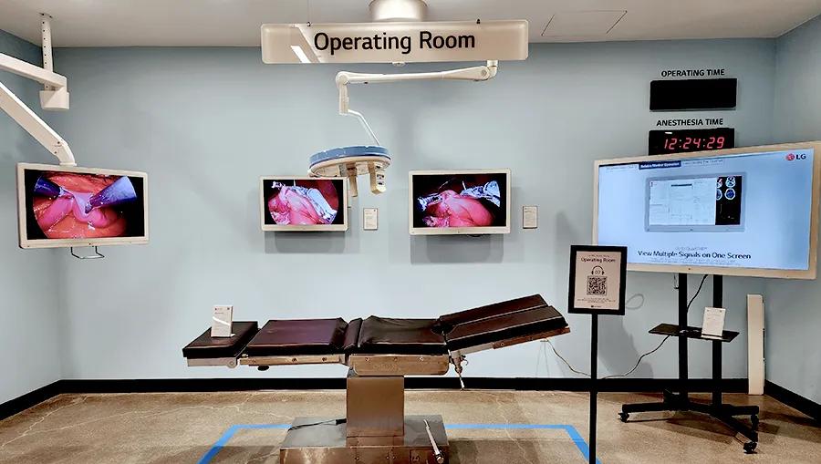 Operating room zone in the LG LA Business Innovation Center, with surgical monitors around an operating table.