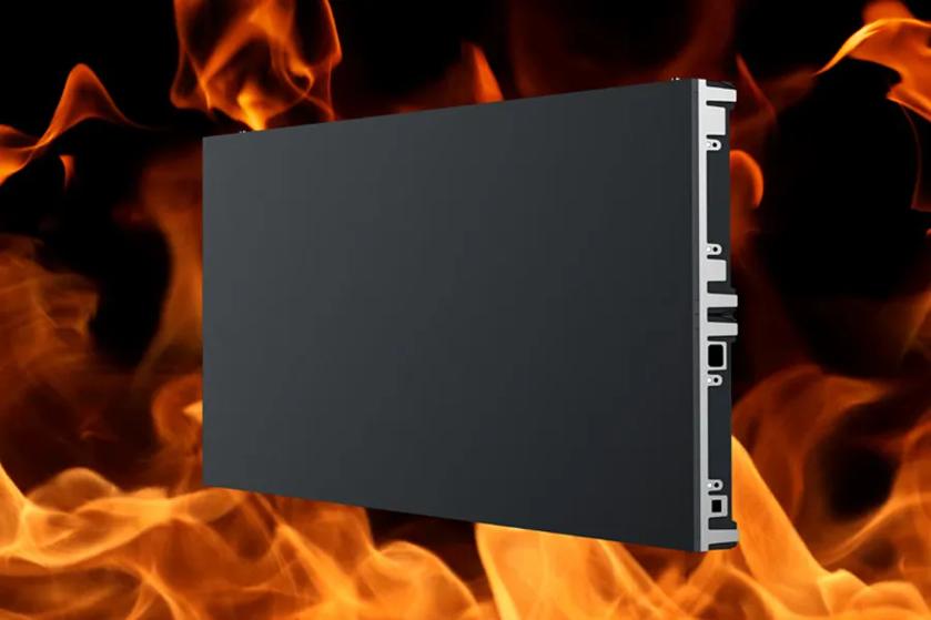 A dark rectangular panel against a background of orange and red flames.
