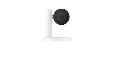 LG indoor security camera with circular lens mounted on a white stand base