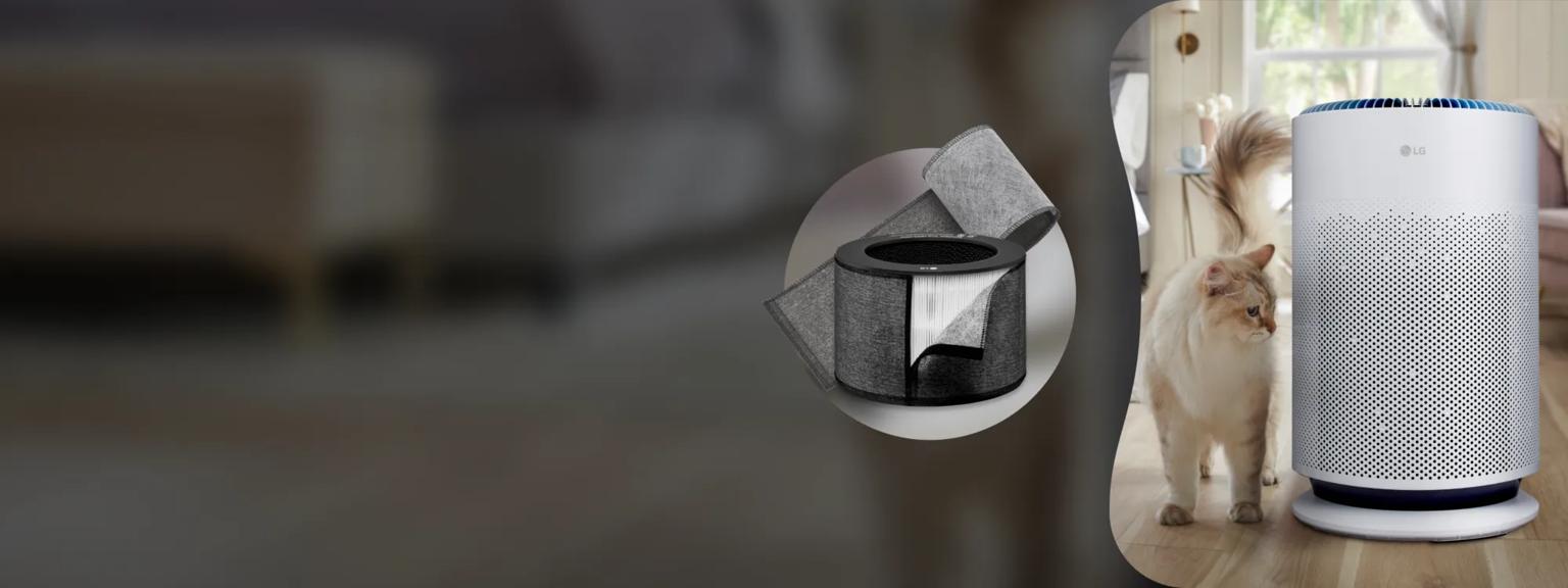 A cat stands next to an air purifier in a living room.